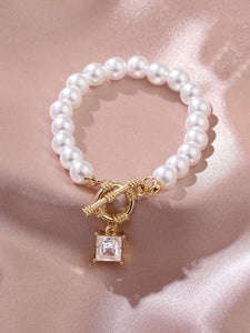 Single pearl bracelet with bling charm