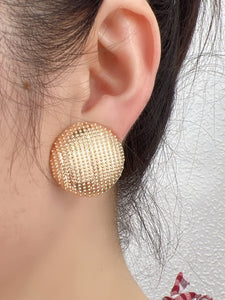 Gold button earring